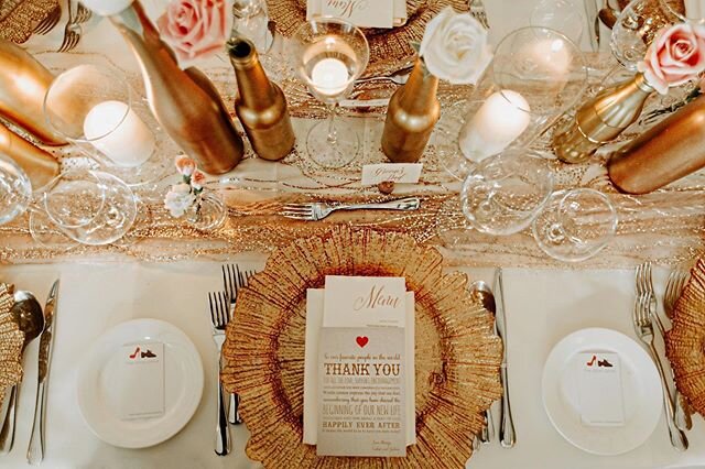 For our uber cool couple who loves drinking, we incorporated wine details into their decor&mdash; rose gold wine bottles filled with tall candles and fully bloomed roses, and calligraphed place cards on wine bottle corks. The bridal table was elegant