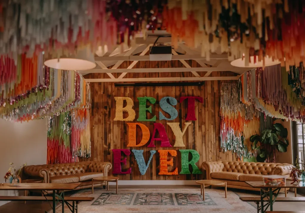 A huge pinata letter display that says 'best day ever'.