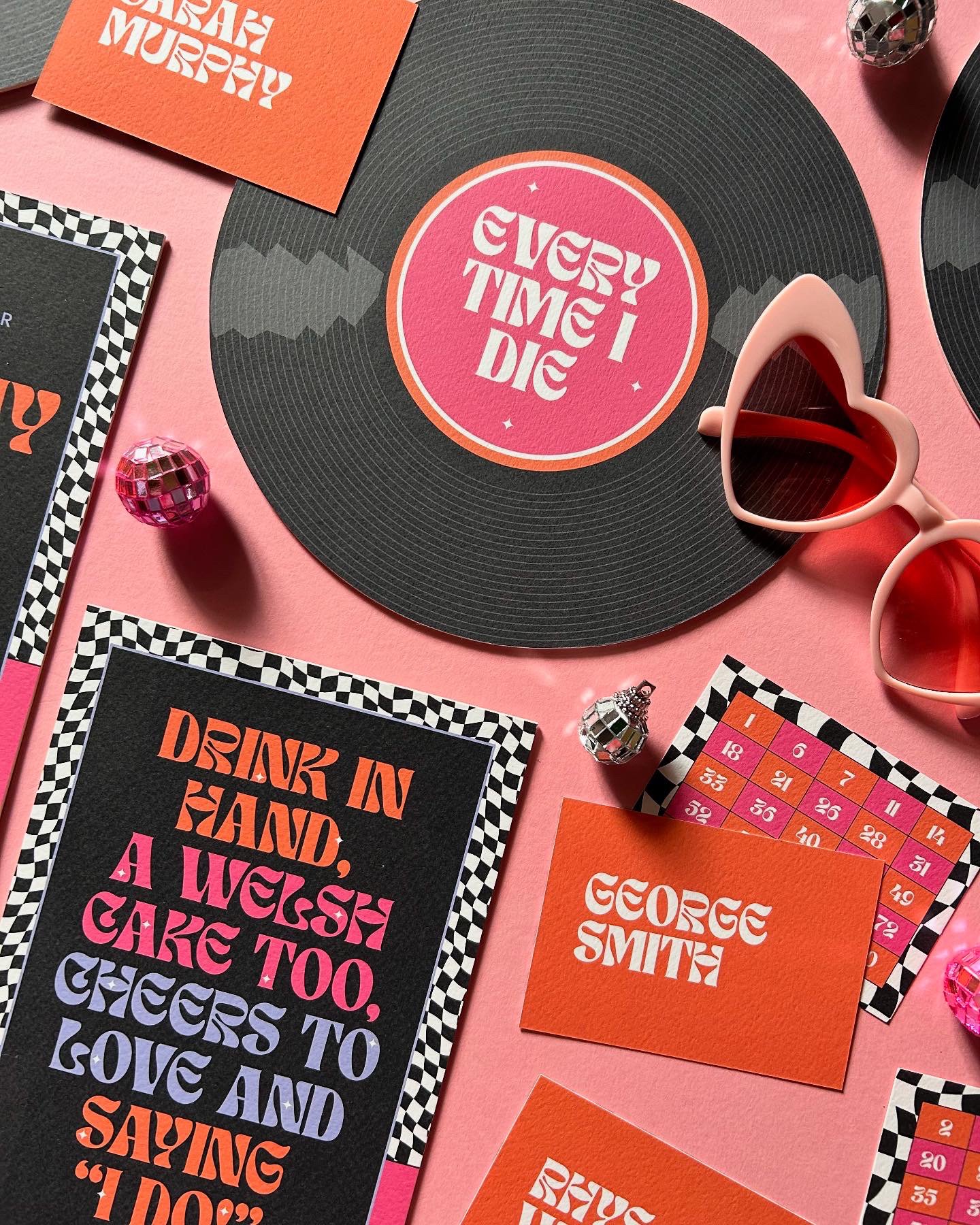 Signs and bingo cards with a rock n roll theme.