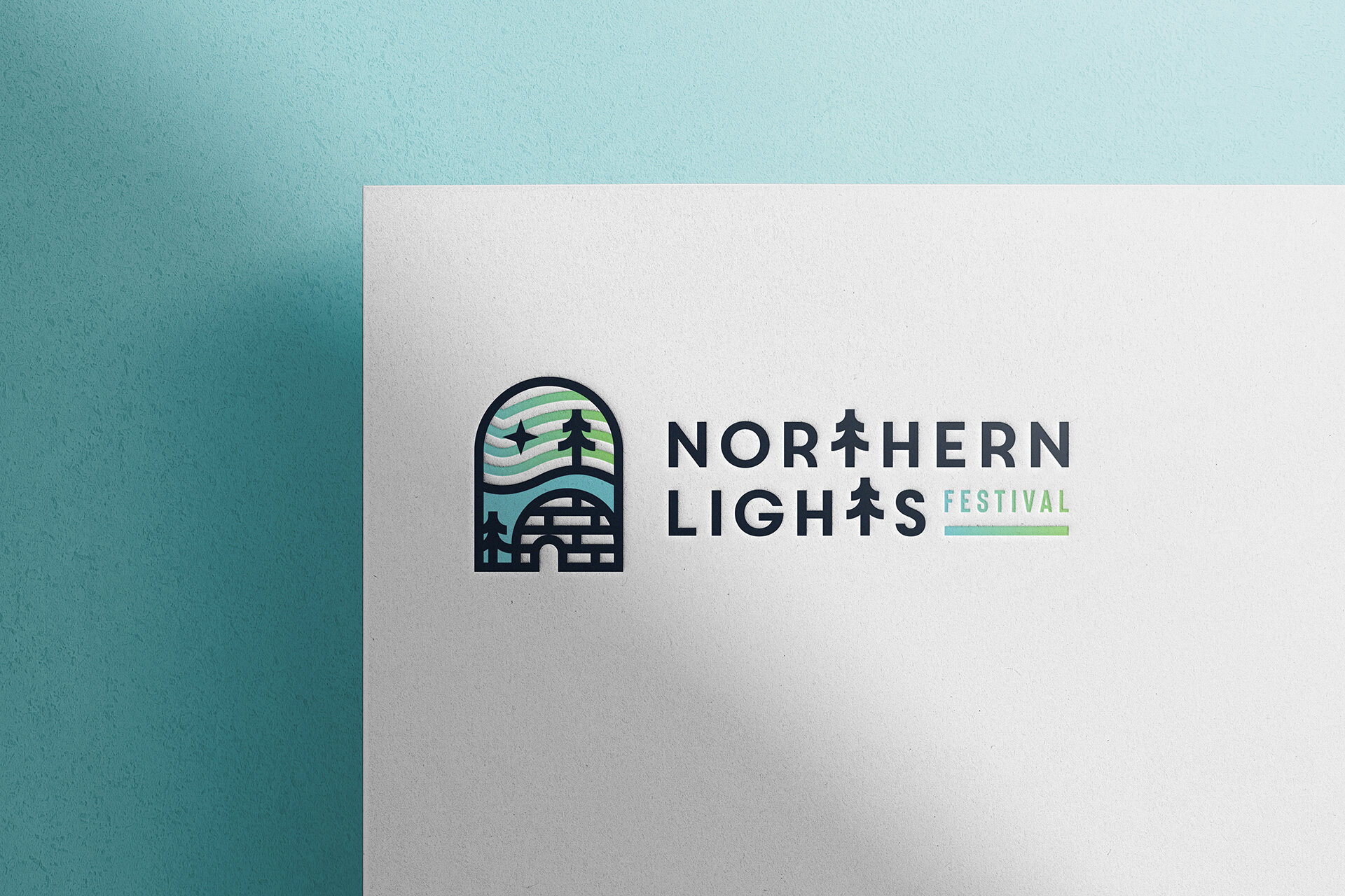 Portfolio_Branding_NorthernLightsFestival_Logo_V1_Paper_Mockup_OptA_P2_1920x1280_2021-04-01.jpg