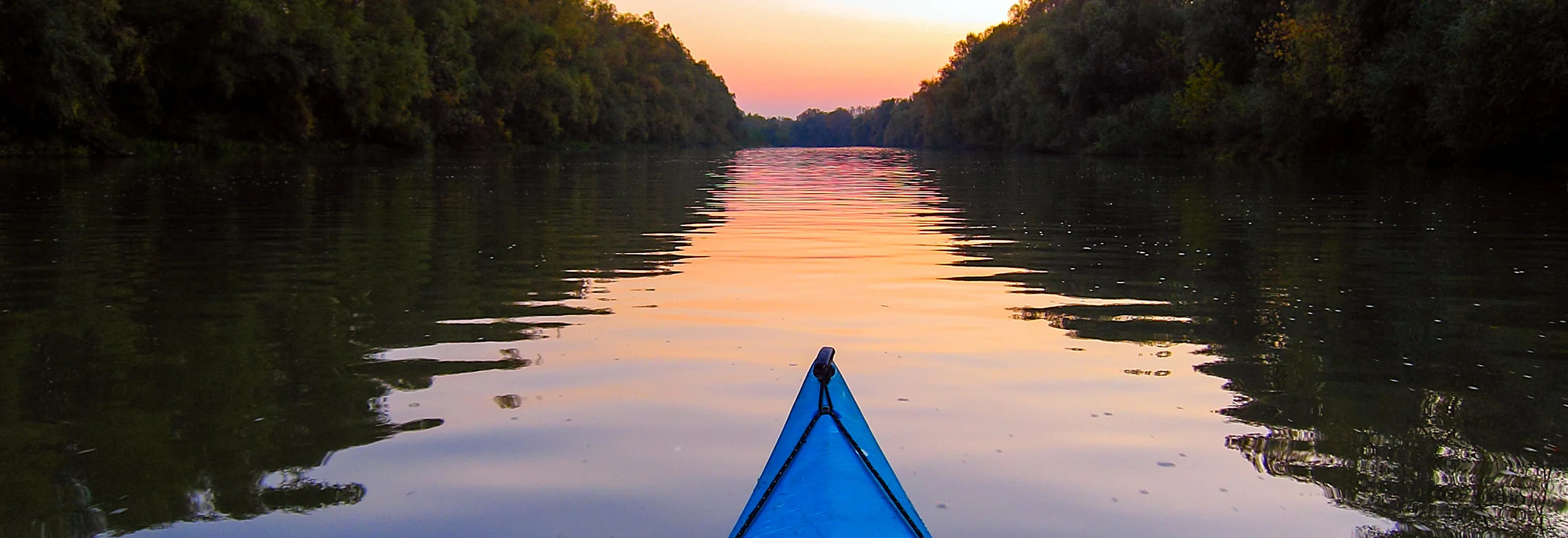 RiverSunsetKayakNose.jpg