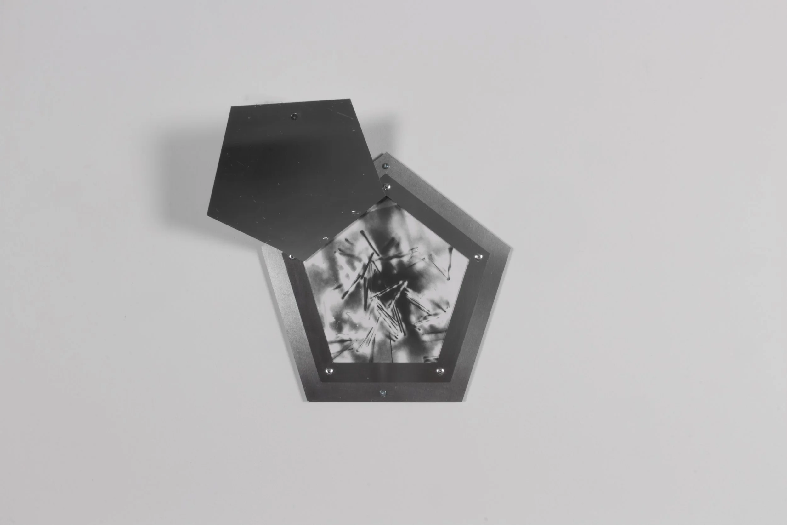 Vessel (Pentagon)
2025
Aluminum, Thermal Paper Print, Hardware
12×12in
$1000