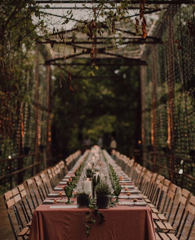 One year ago we got to be a part of this beautiful rehearsal dinner with @farthingevents where they transformed this old bridge into the most beautiful setting 💫Lighting: @omni_lighting, Florals: @eversomething, Photography: @codyandallisonphoto #ok