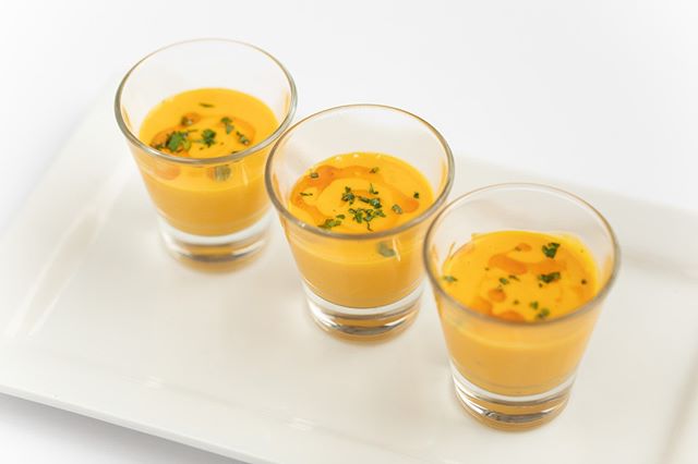 Our Sweet Carrot Soup Shooters are great for Holiday gatherings! Let us help you create the perfect menu for your guests. #holidayparties #tulsaok #catering #jtrcatering #tulsacatering #holidaycatering #fallfoods #tulsafood #eatlocaltulsa #soupshoote