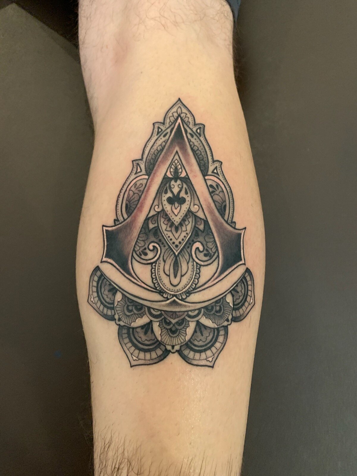 From Blades To Brotherhood The Artistry Of Assassins Creed Tattoo Designs   TATTOOGOTO