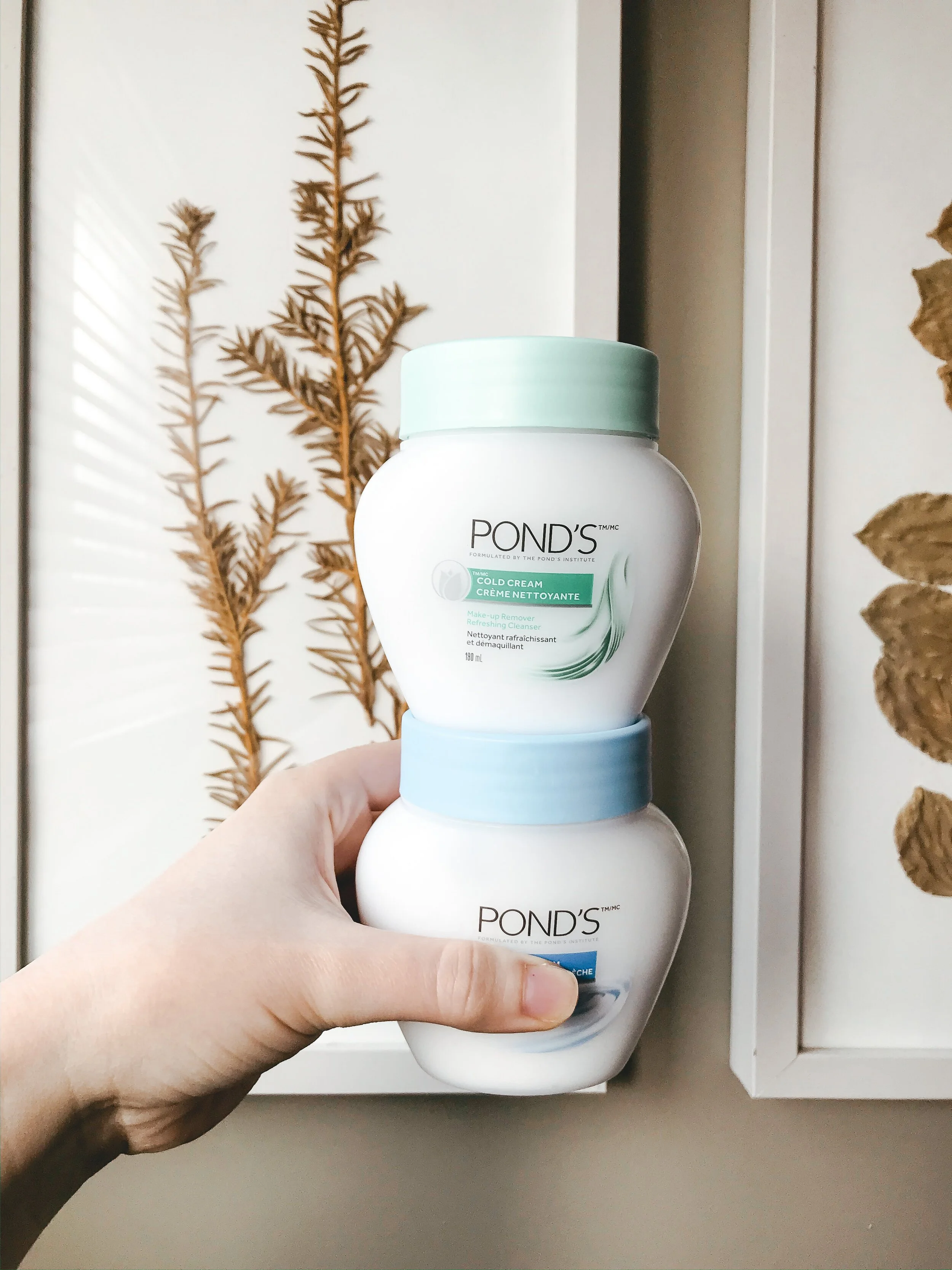 photo of POND'S cold cream and POND'S cold cream cleanser containers.