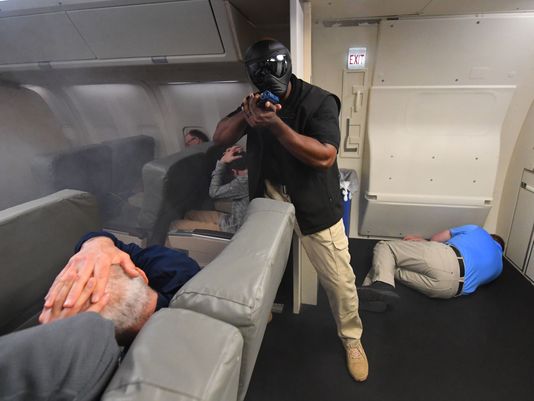 Federal Air Marshals Train Inside A Newton Design Simulator