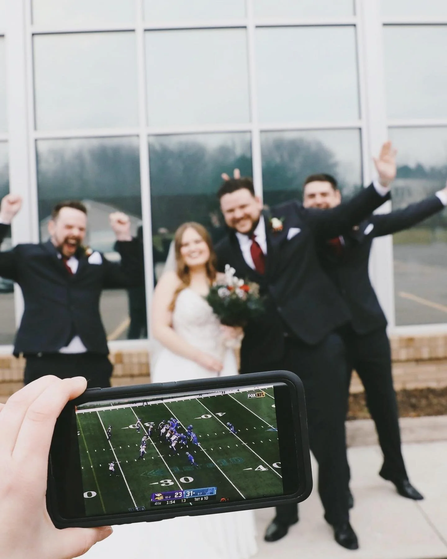 This is what happens when you're a Detroit Lions fan and the team is playing during portraits. 😂

All Rights Reserved. www.KristinaKaylenWeddings.com Copyright &copy;2022 Kristina Kaylen Photography.

#hollyweddingphotographer #hollywedding  #michig