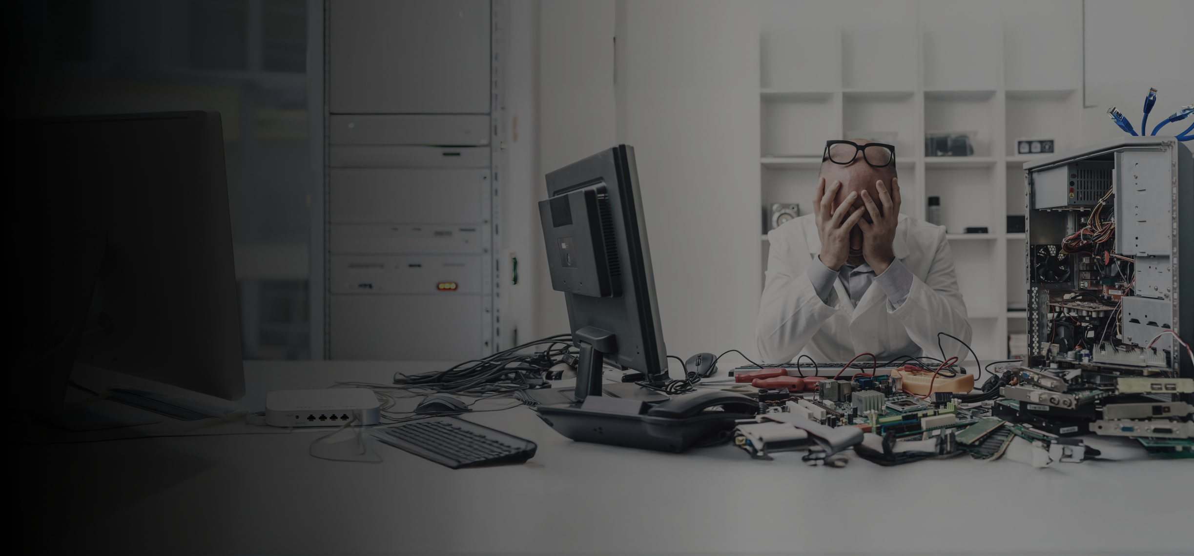 Frustrated IT Guy In Server Room Banner.png
