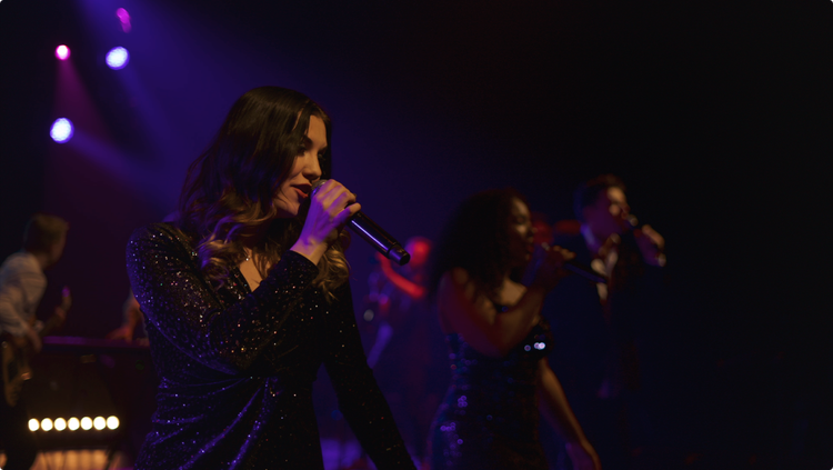 The Live Notes female vocalists performing