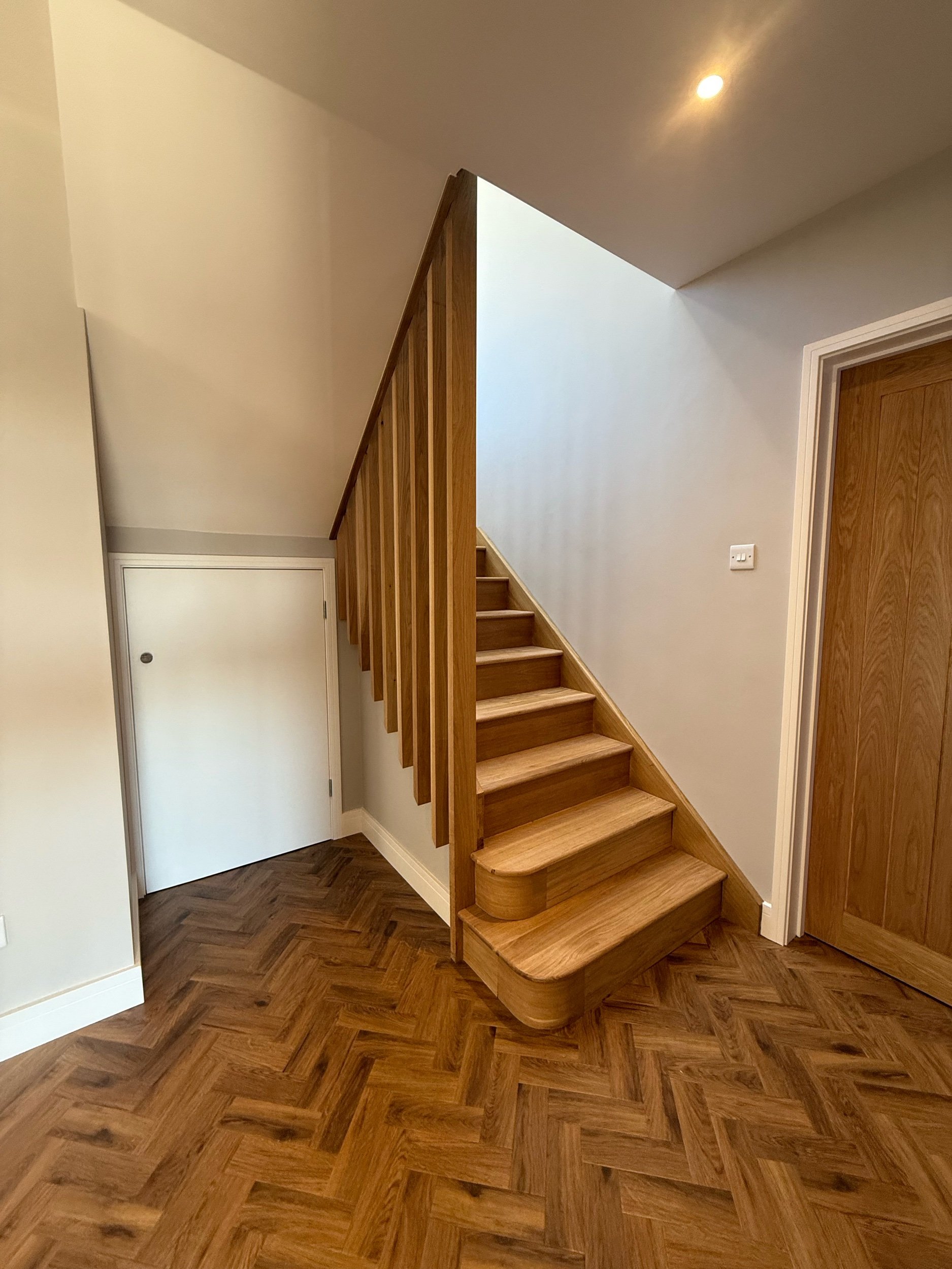 Oak stair case and herringbone floor 