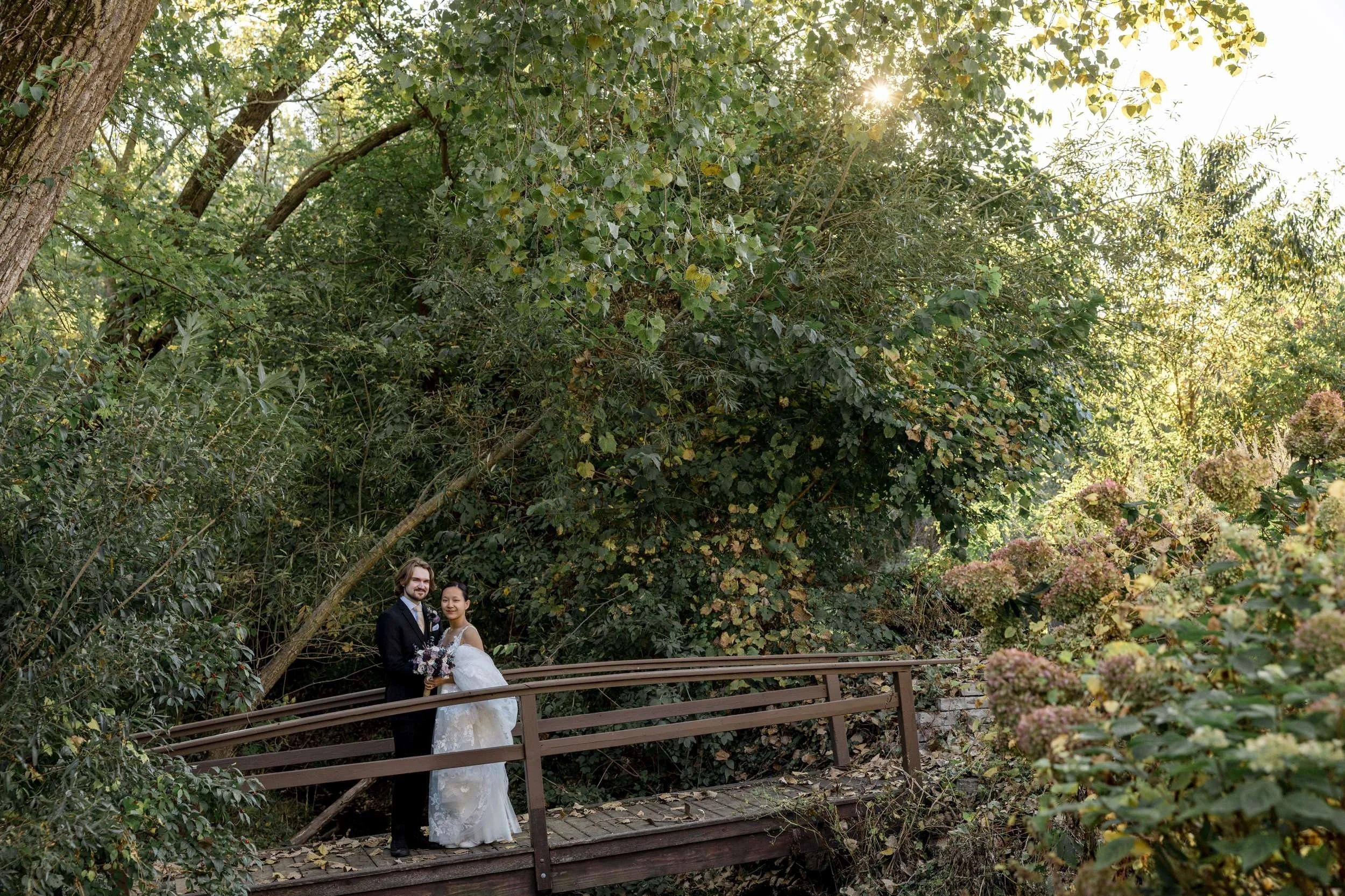 Couple portraits by water feature at Hidden Creek Estate wedding Illinois