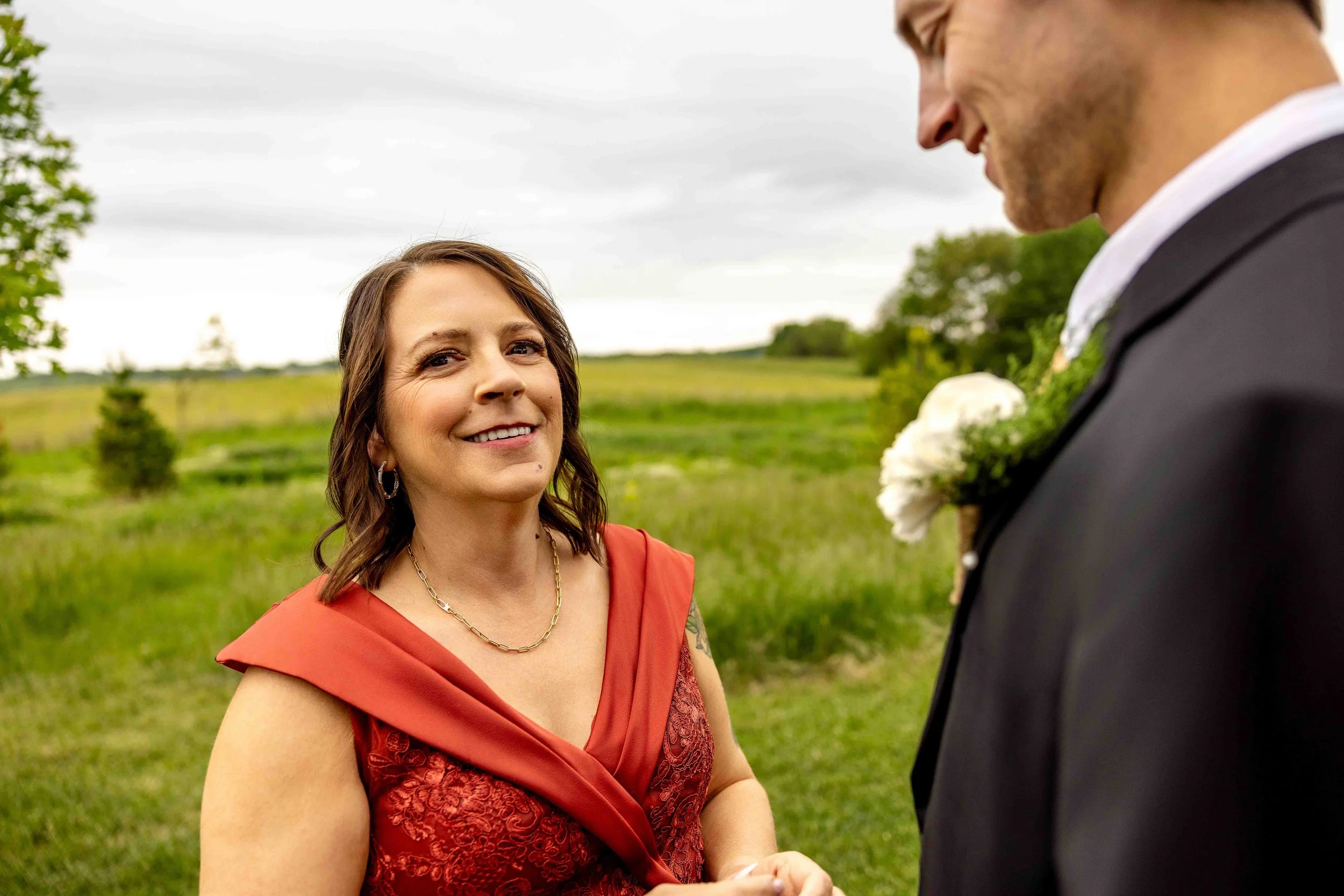 Groom making final preparations before the ceremony at Walnut Ridge Venue near Cedar Rapids, Iowa.