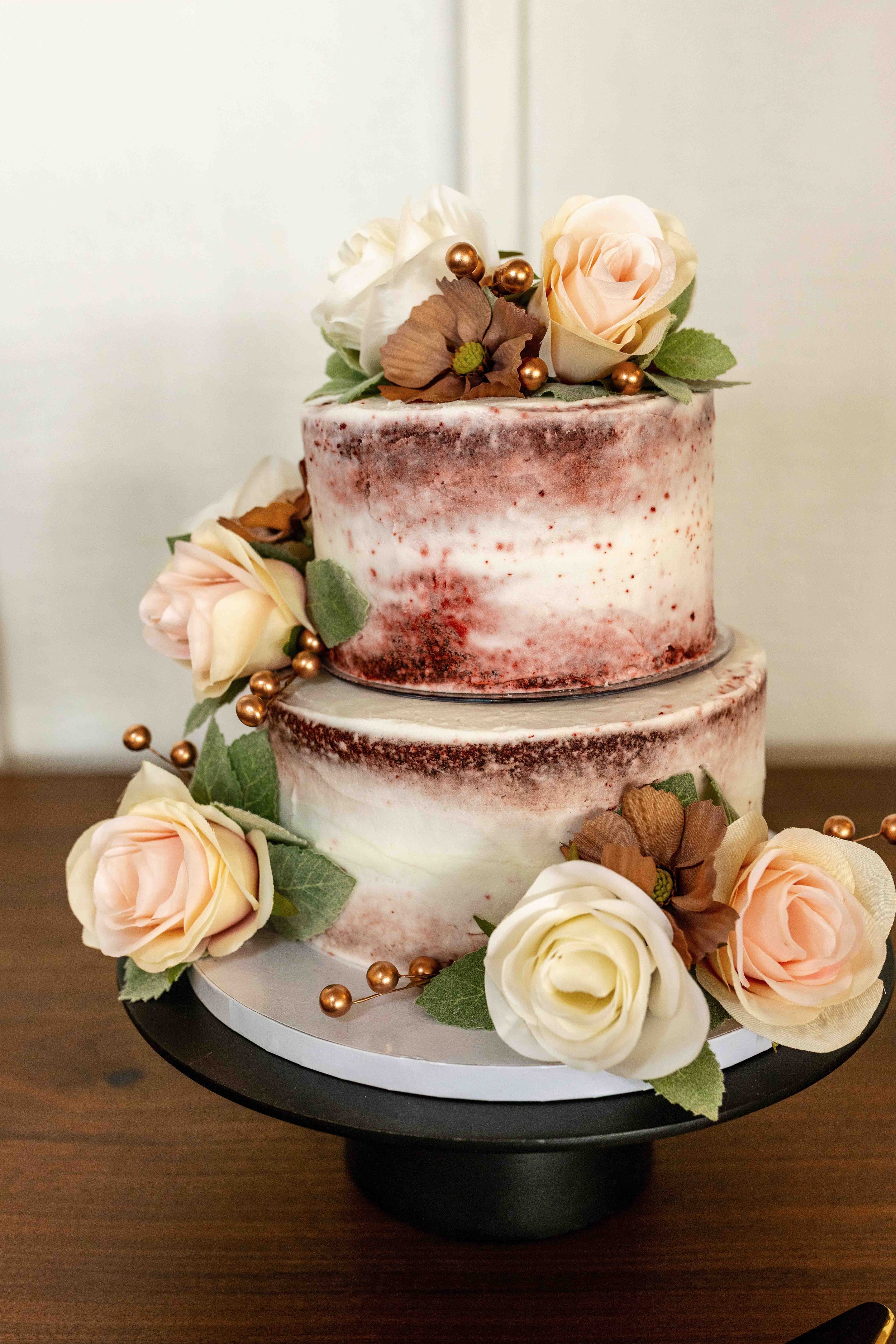 Elegant Wedding Cake with Sola Wood Flowers at Walnut Ridge Venue