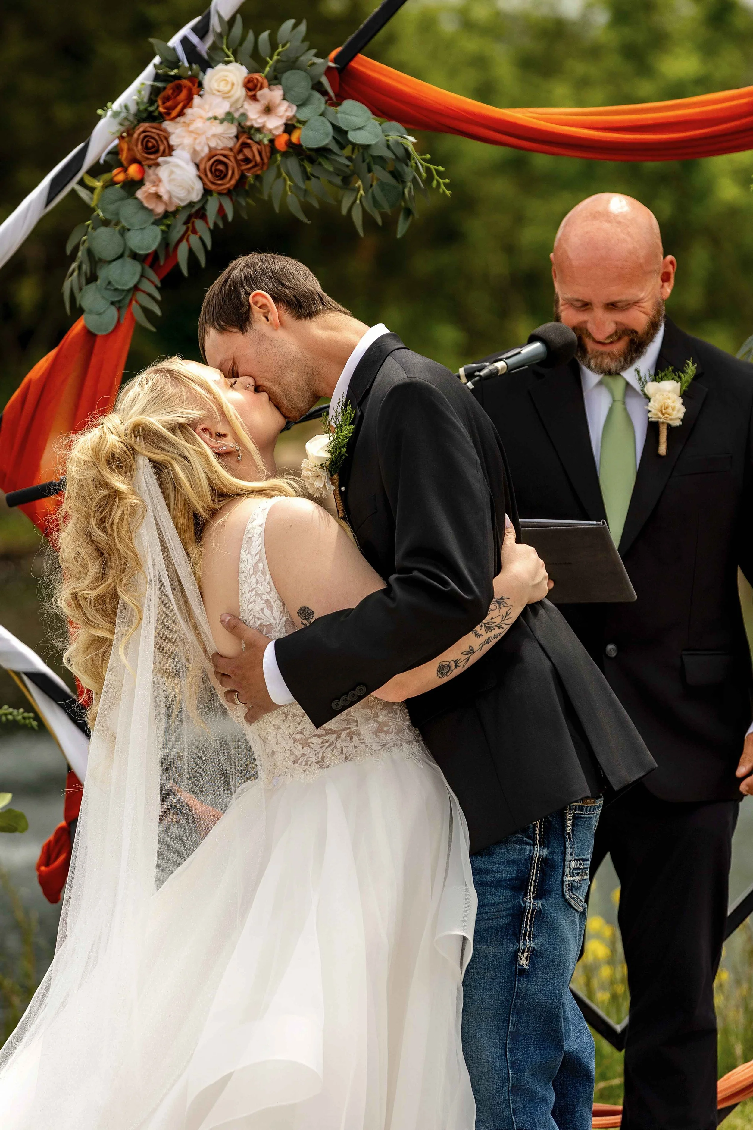 First Kiss Summer  Outdoor Wedding Ceremony at Walnut Ridge Venue
