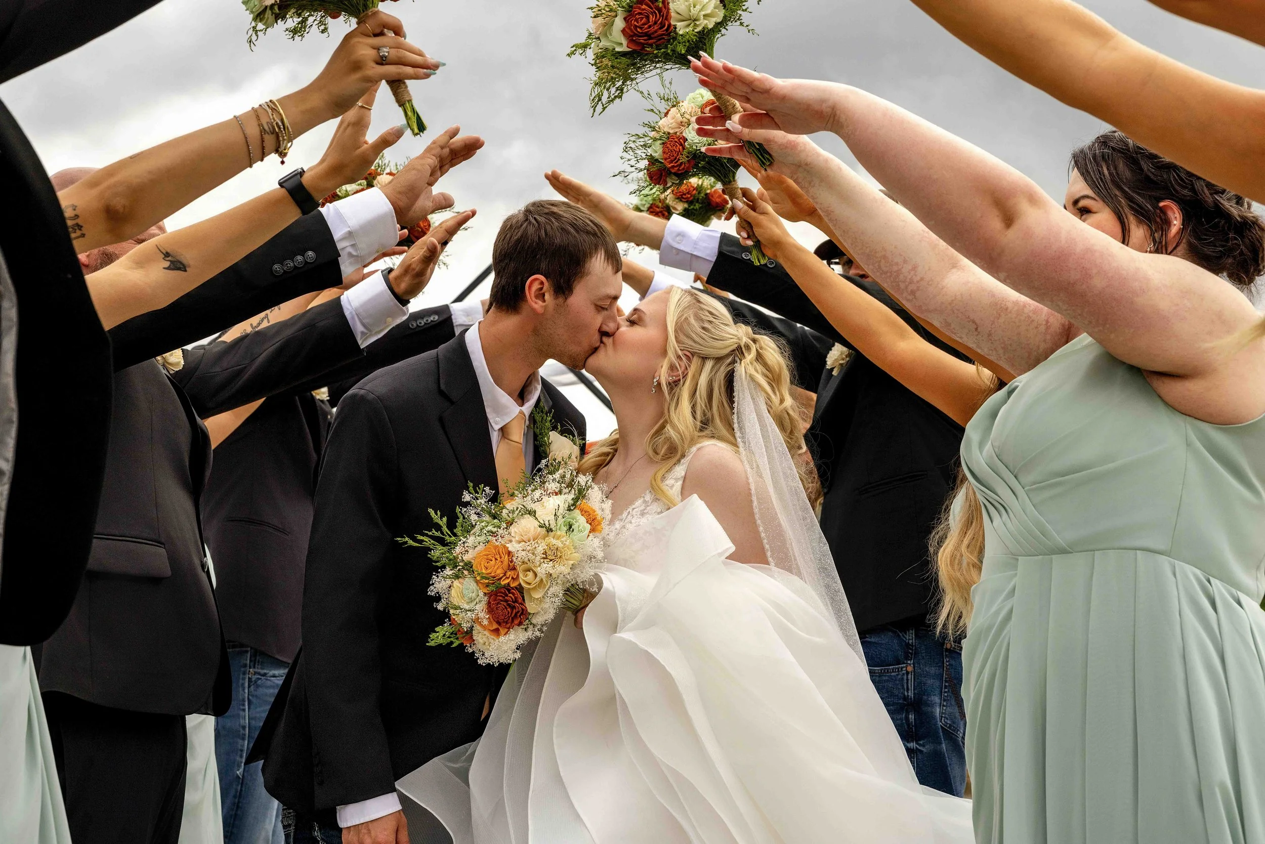 Their First Kiss as Husband and Wife at Walnut Ridge Venue