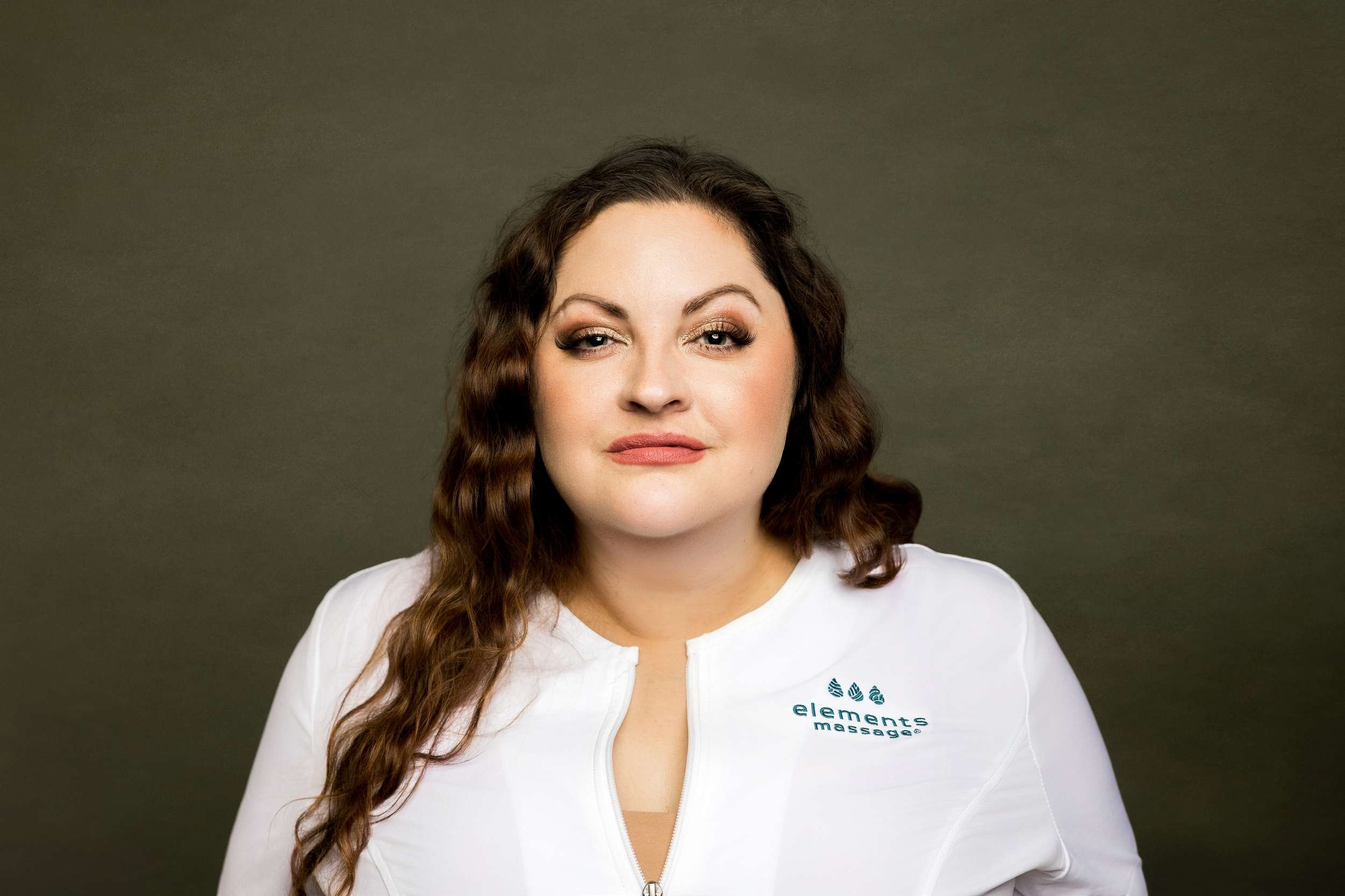 Professional branding portrait of a Janesville Wisconsin business owner in a modern studio