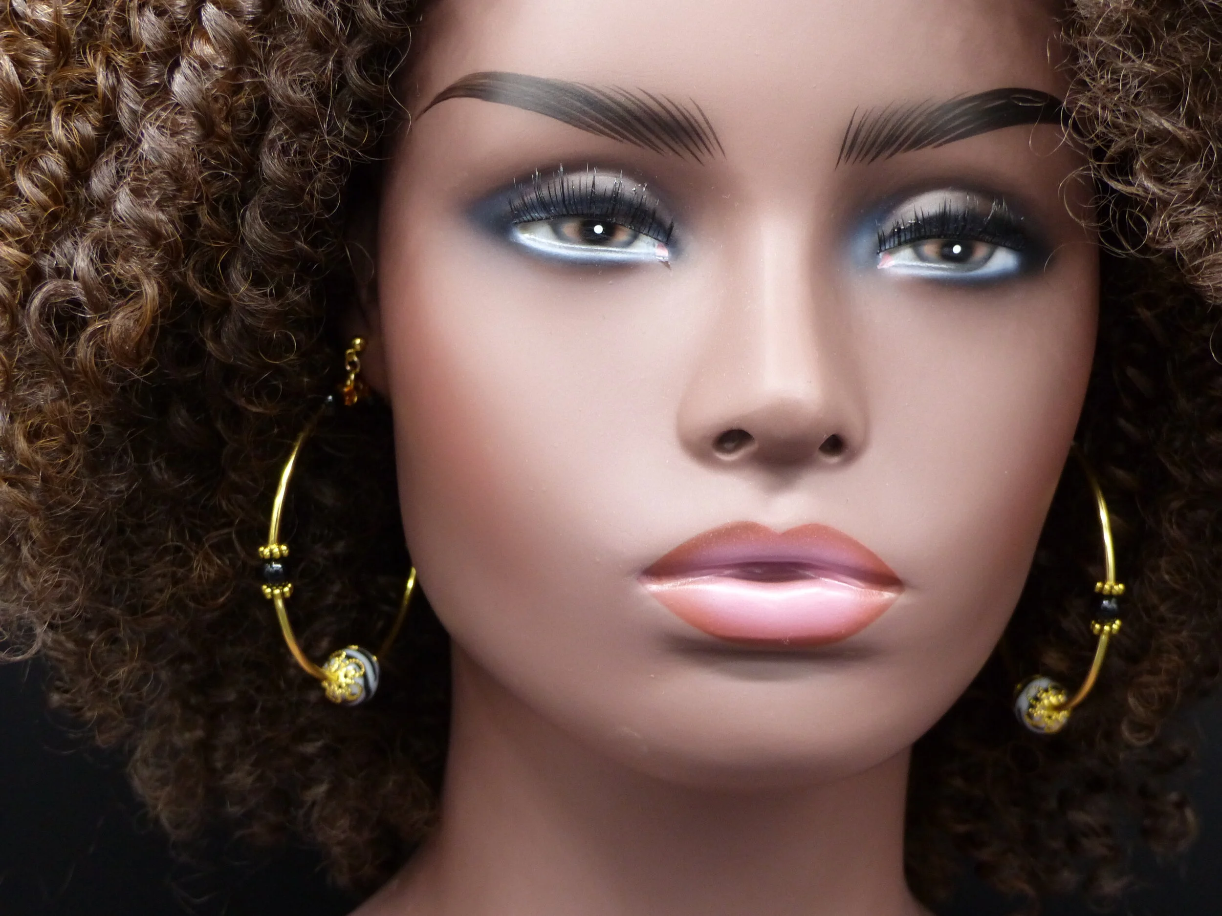 Earrings_Safari Hoops on model.jpg