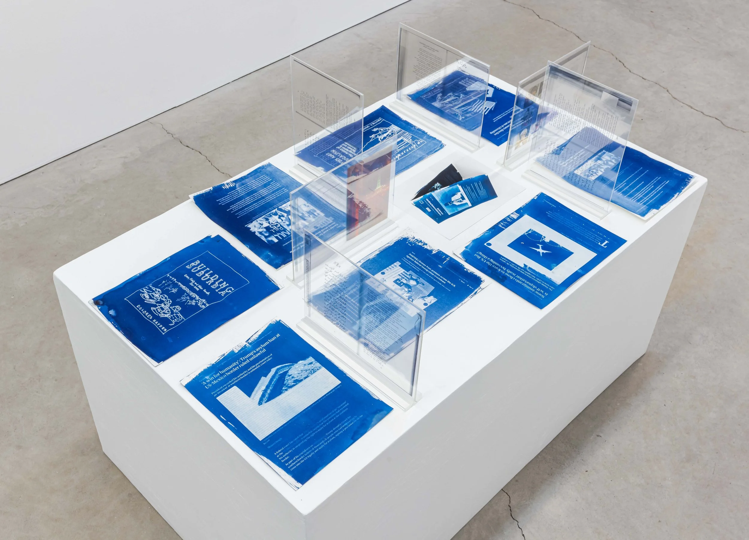   Studio Desk , 2026. cyanotypes on watercolour paper, transparency prints in plexi holders, inkjet print. 36 x 30 x 50 in. (91.5 x 76 x 127 cm). Photo by Toni Hafkenscheid 