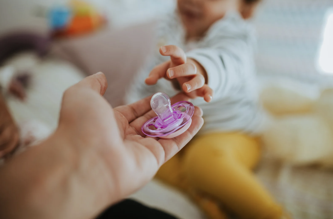 Pacifiers + Breastfeeding: What to Know Before You Pop One In