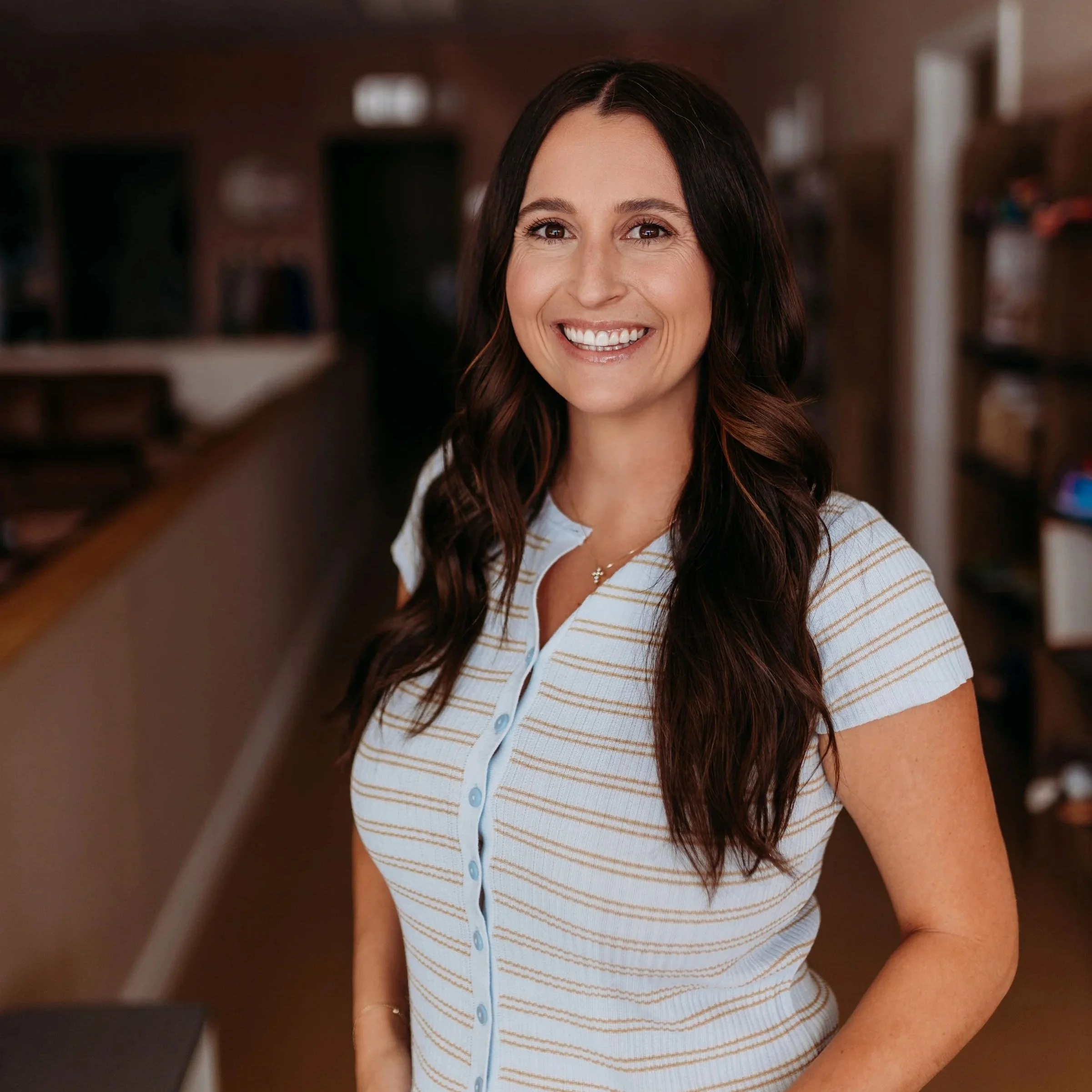 Hailey, an internationally board-certified lactation consultant (IBCLC) and registered nurse (RN), offering expert breastfeeding support in a warm, natural setting.