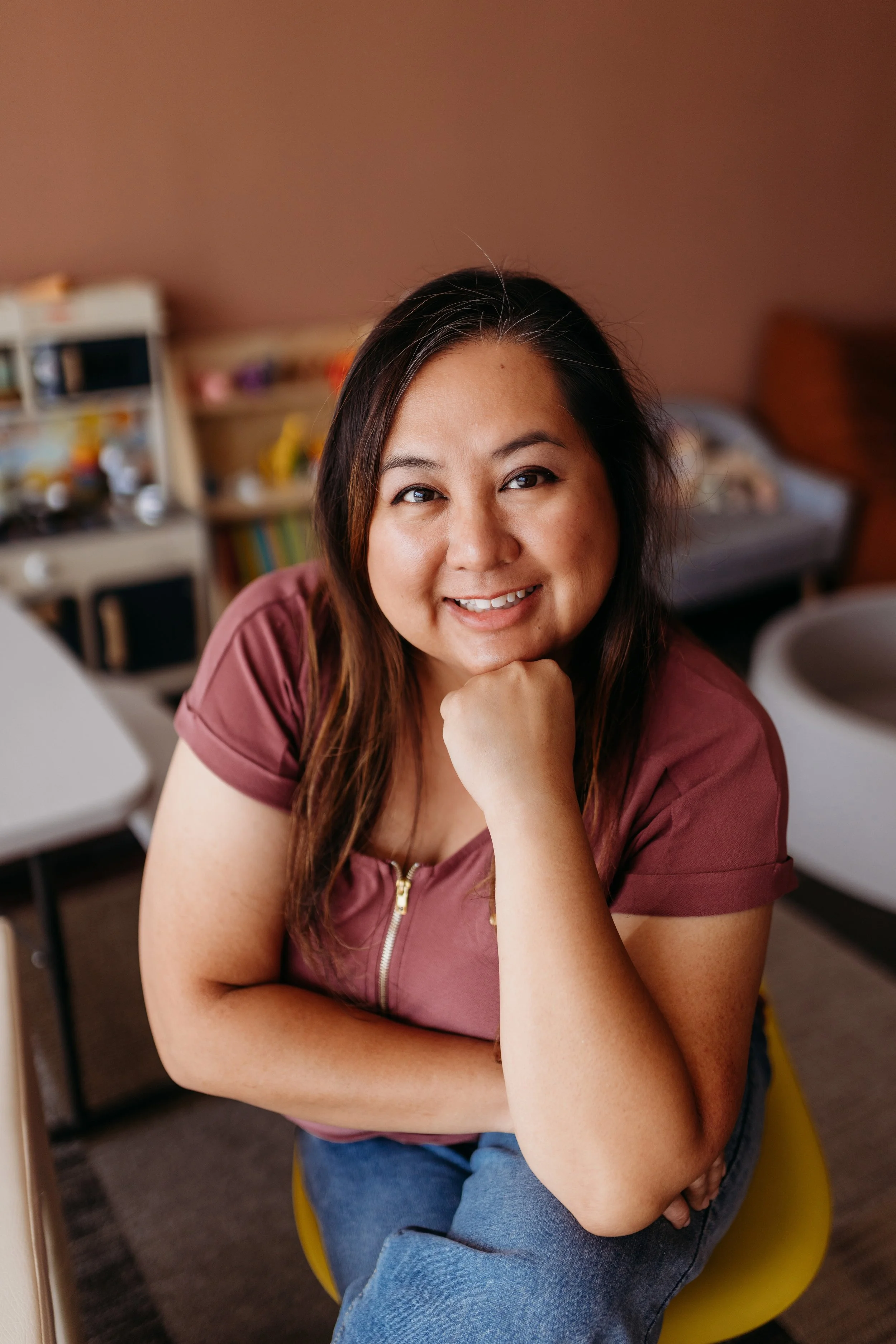 Lauren G, an internationally board-certified lactation consultant (IBCLC) and registered nurse (RN), offering expert breastfeeding support in an outdoor setting.