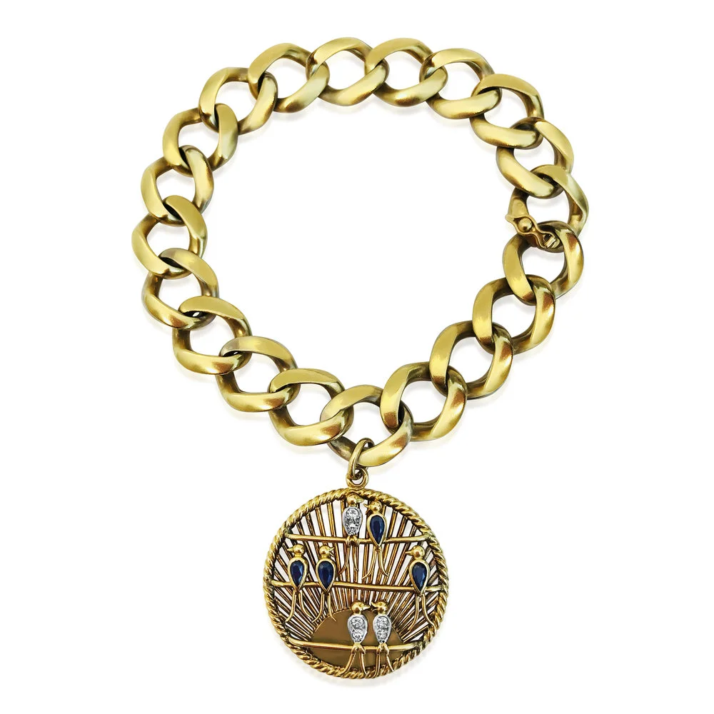 A Gold, Sapphire and Diamond Charm Bracelet, by Van Cleef &amp; Arpels