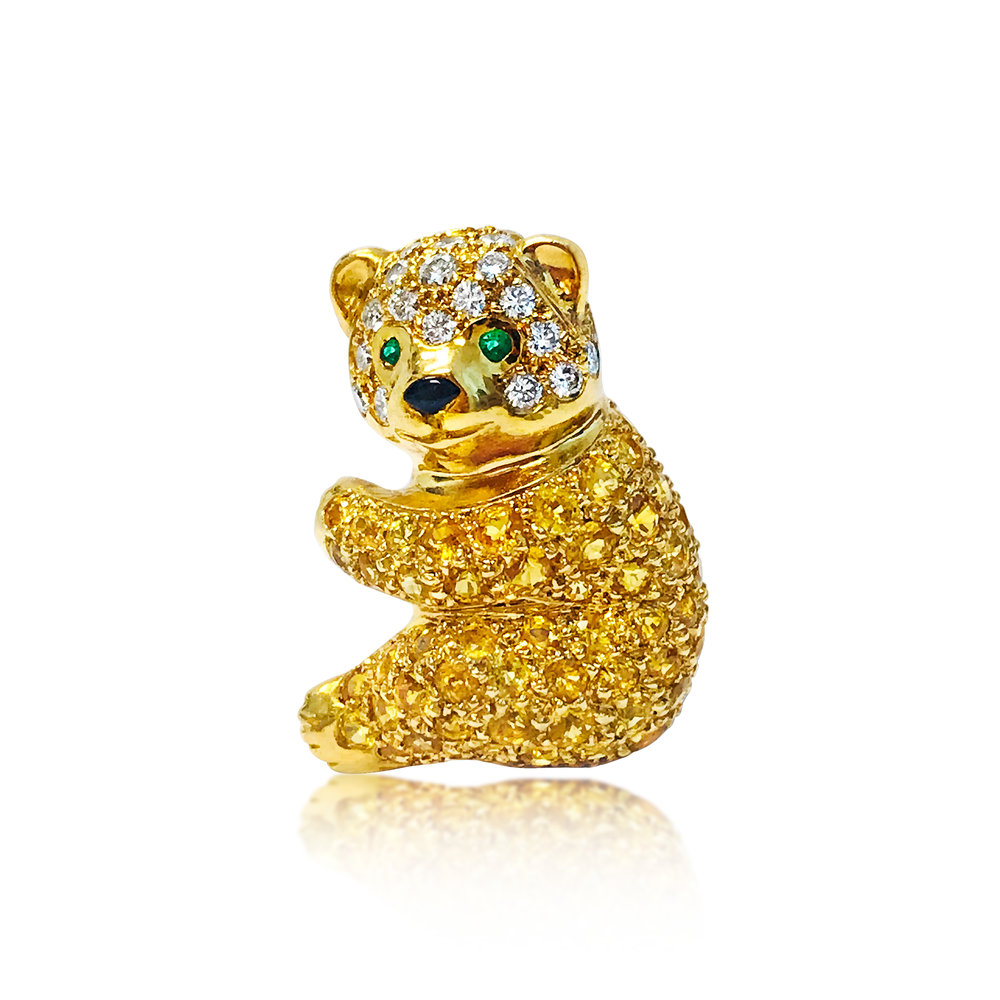 A Yellow Sapphire and Diamond Bear Pin by Van Cleef &amp; Arpels  