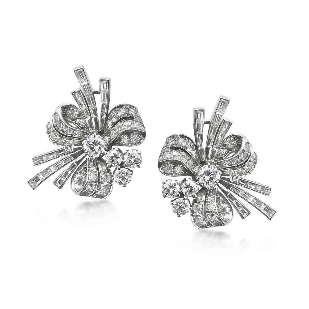 EA170_RVJ+PO-599_A+pair+of+diamond+and+platinum+ribbon+ear+clips.jpg