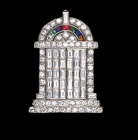An Art Deco "Temple of Love" brooch, featuring baguette diamonds on the hinged doors. It was offered by Christies's as Lot 204 in a New York sale in October 2001. By Black, Starr & Frost.