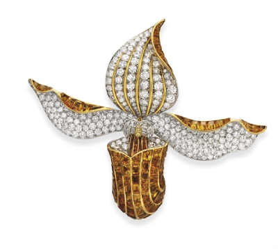    A Diamond and Citrine Orchid Brooch, by René Boivin.   