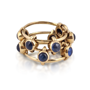 A Yellow Gold and Sapphire "Abacus" Ring, by JAR, circa 1979 (Available at Revival Jewels). (Literature: Cf. JAR Paris, JAR Paris 2002 Arts Books International, Somerset House Exhibition, Plate 197).