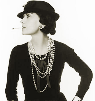 Coco Chanel was one of the first women to wear trousers, cut her hair, reject the corset and to wear rope of pearls with casual-wear. 