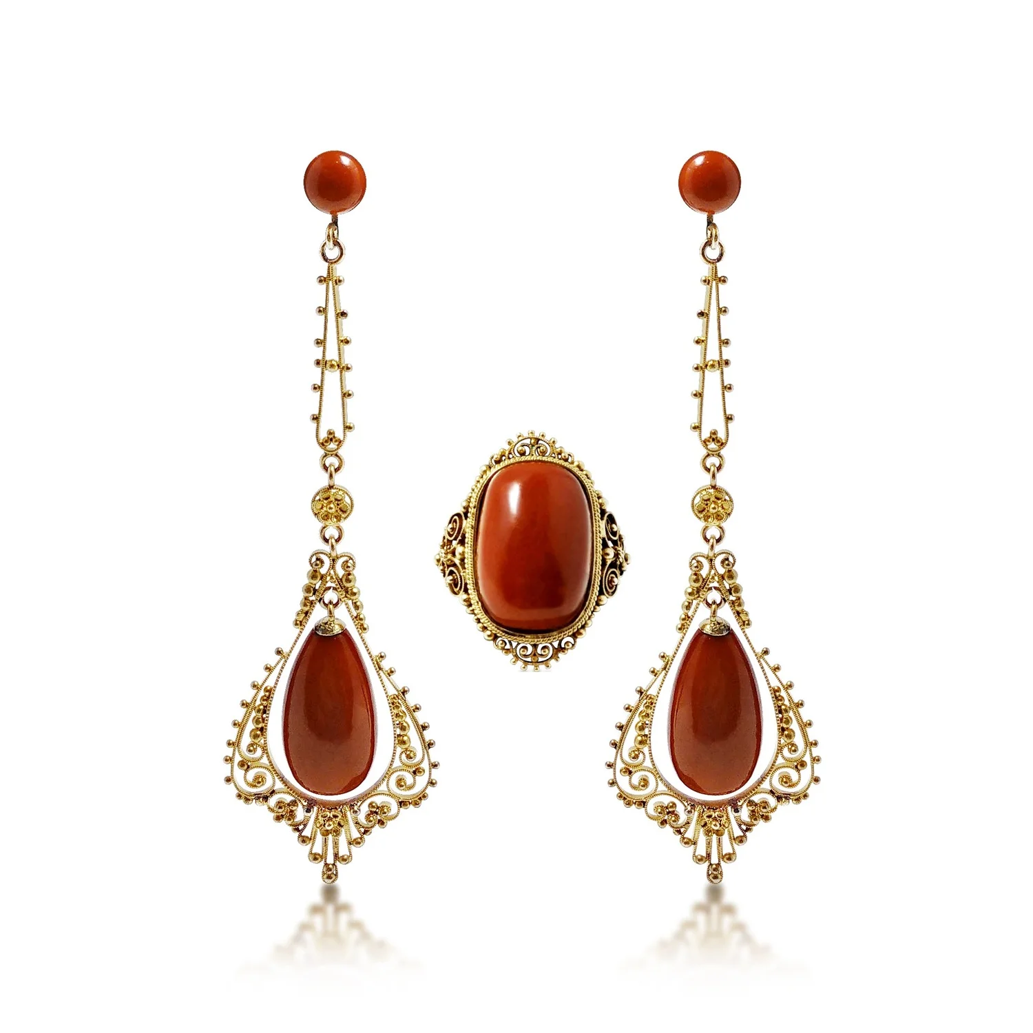 A Set of Yellow Gold and Coral Ear Pendants with Matching Ring The vibrant hue of gorgeous red coral takes centrestage in this set, which features a pair of dangling earrings with round bead and drop-shaped coral, and a ring with a cushion-cut coral. Accentuating the gems is masterful gold beading and rope work. The ear pendants measure approximately 7.1 cm long, while the ring is sized 5.5.