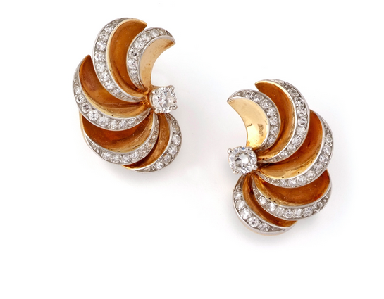 A Pair of Yellow Gold and Diamond Swirl Earrings, By René Boivin, Circa 1937 Flaunting old European and round-cut diamonds mounted on yellow gold, the earrings are designed in a swirl design very popular in the ’50s and ’60s. They also come with French hallmarks and an authenticity certificate from jewellery historian-expert Madame Françoise Cailles. They measure approximately 1.2cm by 2.5cm.