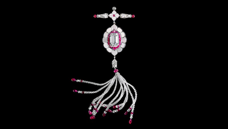 A Viren Bhagat diamond and ruby pendant brooch, set with an old 10.03-carat Golconda diamond from India.