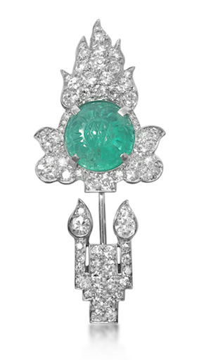 Revival Jewels’ Style Suggestion: An Art Deco diamond and emerald jabot brooch by Cartier, circa 1920. Elegant and tasteful.