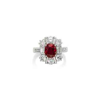 A Ruby and Diamond Ring (Price realised USD 127,564) - Sold by Christie's, 18th May 2016, Geneva. ( Source: www.christies.com ) Set with an oval-cut ruby, weighing approximately 2.08 carats, between baguette-cut diamond shoulders, within a circular-cut diamond surround, ring size 6 ¾, mounted in platinum Accompanied by report no. 80426 dated 4 June 2015 from the SSEF Swiss Gemmological Institute stating that the origin of the ruby is Burma (Myanmar), with no indications of heating, and that the colour may also be called 'pigeon blood red'.