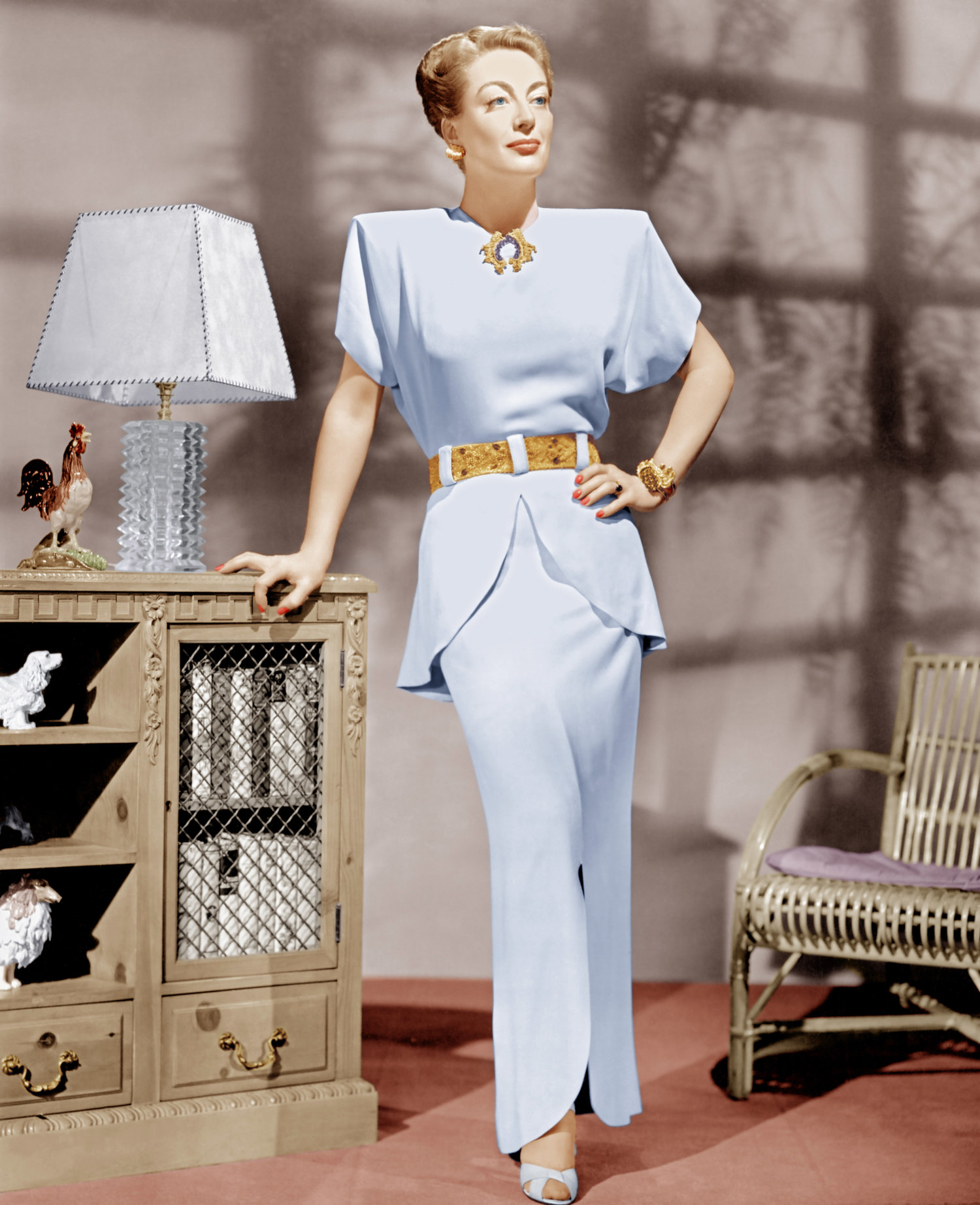 Hollywood star, Joan Crawford in the 1940's. Coordinating skirt and jacket suits, large shoulders, and cinched waists were the order of the day. Image source: http://www.instyle.co.uk/fashion/trends/1940s-fashion-a-decade-in-style-icons