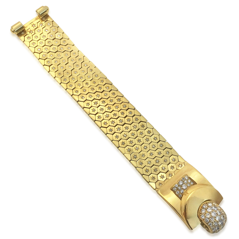 A DIAMOND AND GOLD 'LUDO HEXAGONE' BRACELET, BY VAN CLEEF AND ARPELS. - SOLD