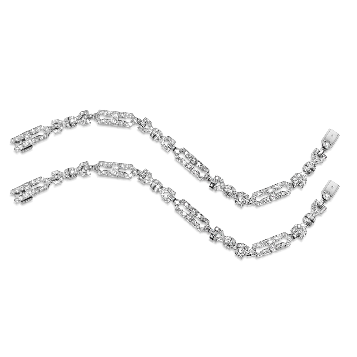 A PAIR OF ART DECO DIAMOND AND PLATINUM BRACELETS, CIRCA 1920S  