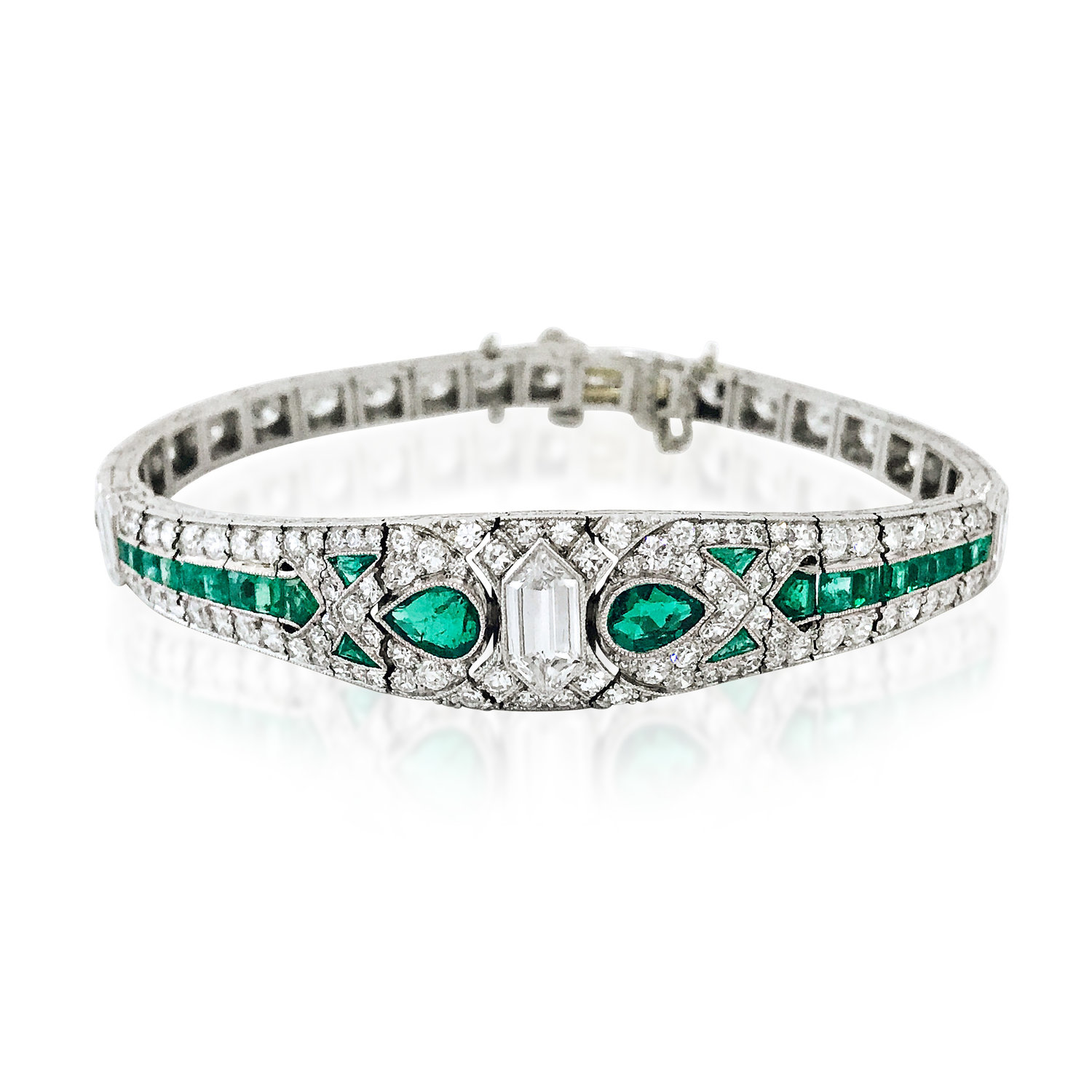 AN ART DECO DIAMOND AND EMERALD BRACELET, BY OSCAR HEYMAN  