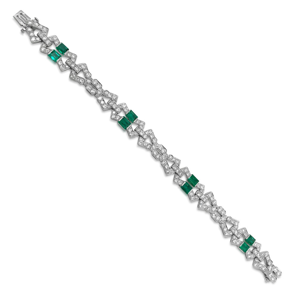 AN ART DECO EMERALD AND DIAMOND BRACELET, BY CHARLES HOLL - SOLD