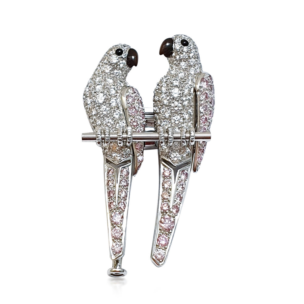 A DIAMOND SET PARROT LOVE BIRD BROOCH BY CARTIER