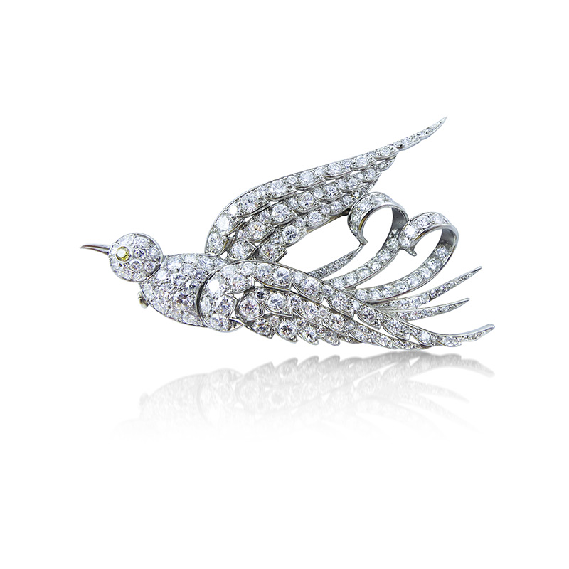 AN ART DECO DIAMOND AND PLATINUM BIRD BROOCH, CIRCA 1930  