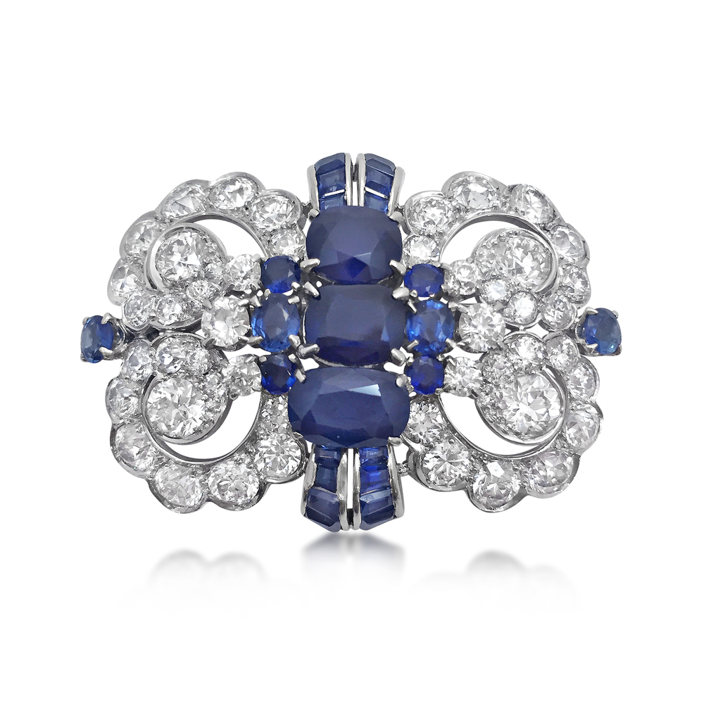 AN ART DECO SAPPHIRE AND DIAMOND BROOCH - SOLD