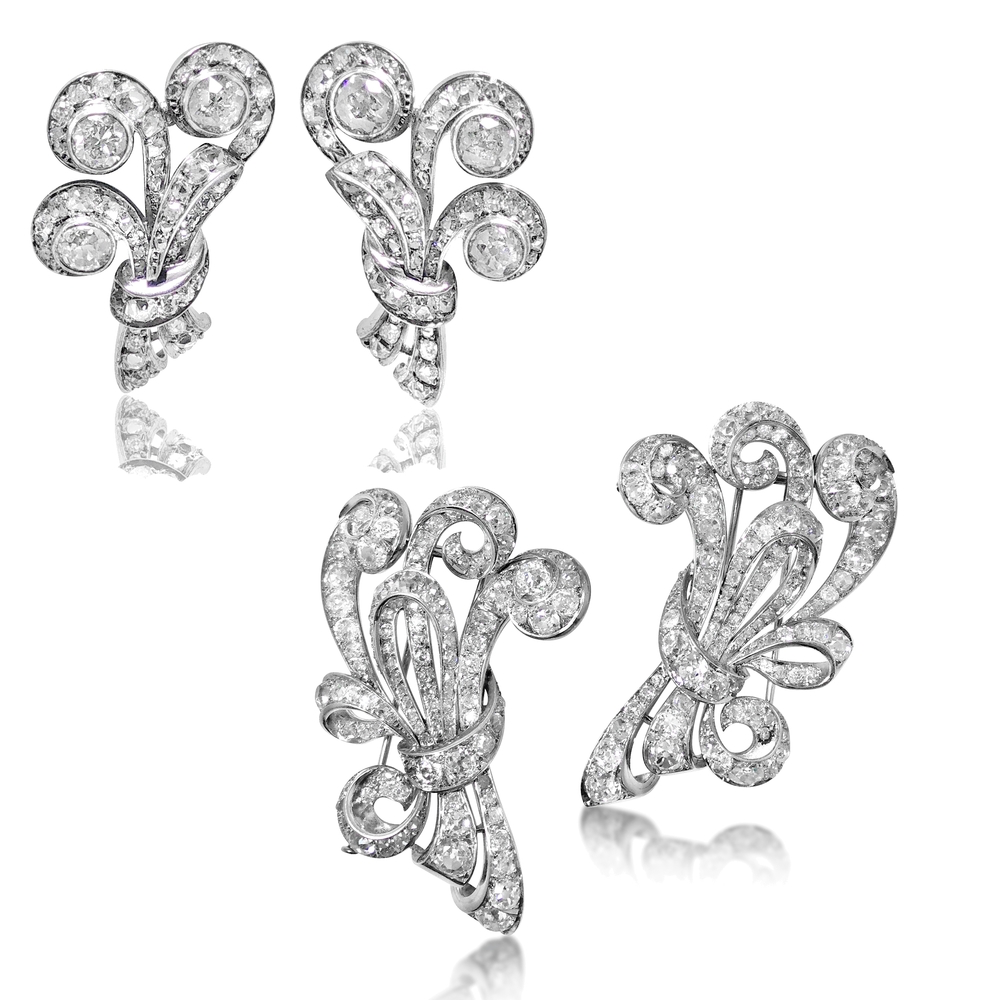 A SET OF DIAMOND DOUBLE CLIP BROOCH AND EAR CLIPS, BY CHAUMET  