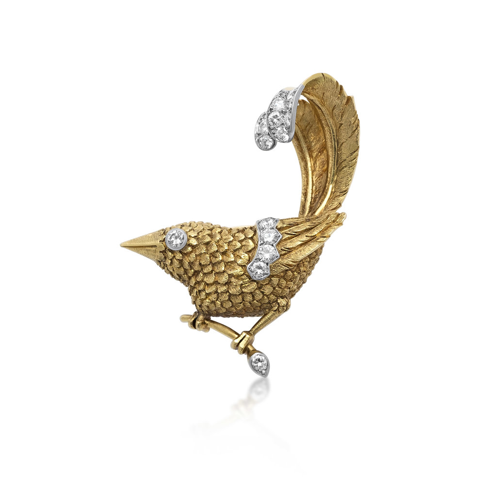 A GOLD AND DIAMOND BIRD BROOCH, BY CARTIER - SOLD