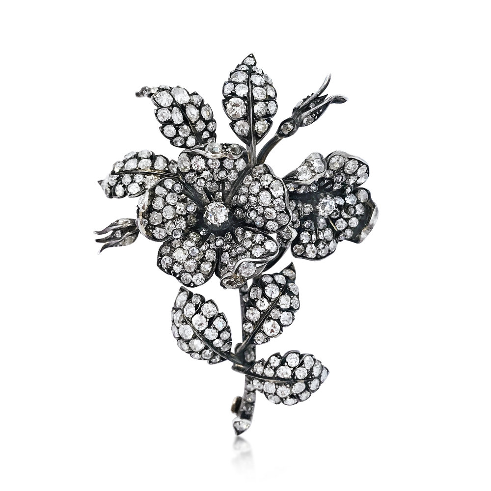 AN ANTIQUE DIAMOND FLORAL TREMBLANT BROOCH - SOLD