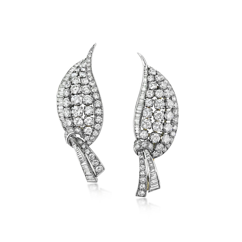 A 1950'S PAIR OF PLATINUM AND DIAMOND CLIP BROOCHES - SOLD